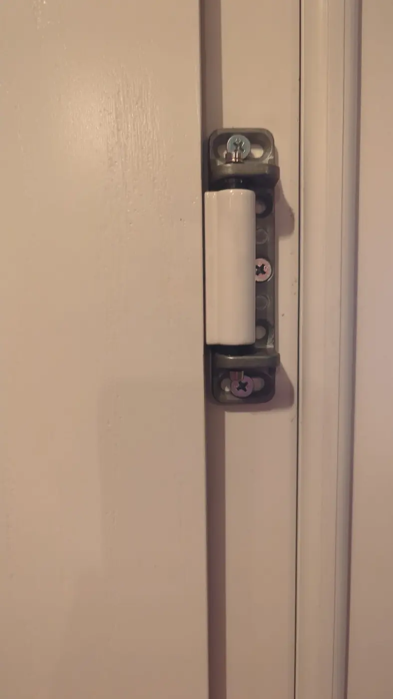 uPVC door hinge and mechanism repair in progress in Fermanagh